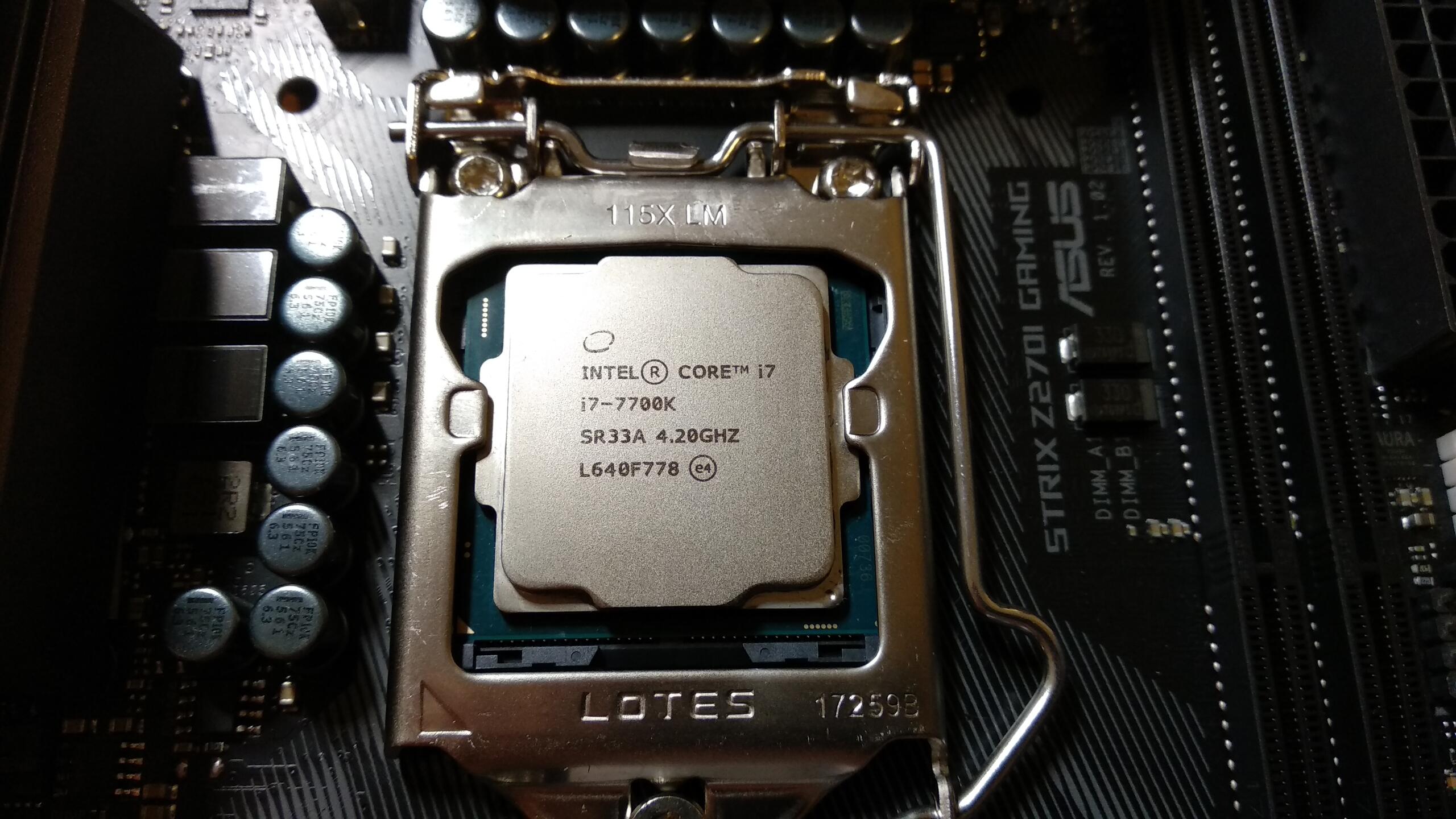 The CPU fitted in its socket, waiting for its thermal paste.