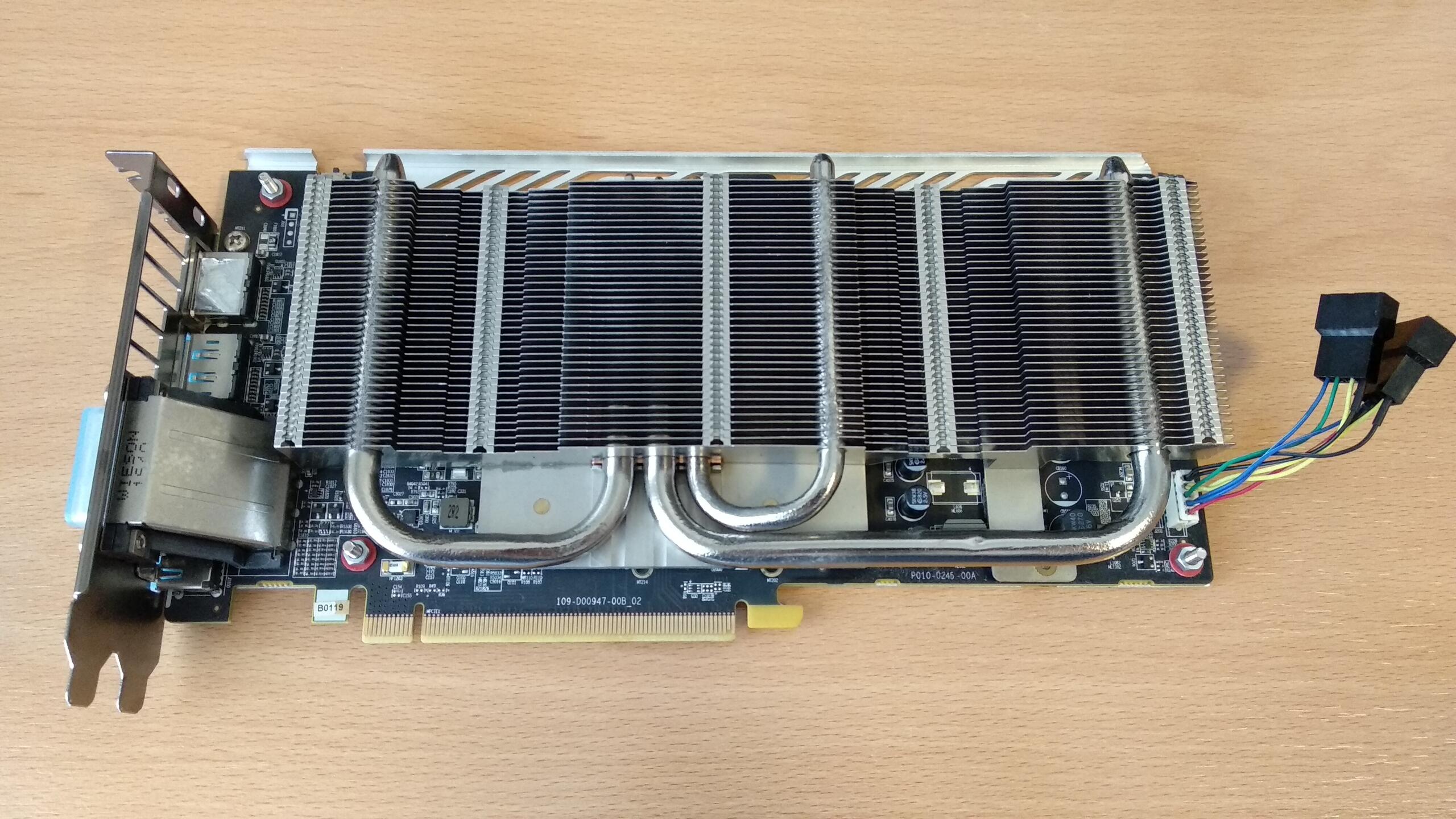 The graphics card with the backplate and the adapter attached.